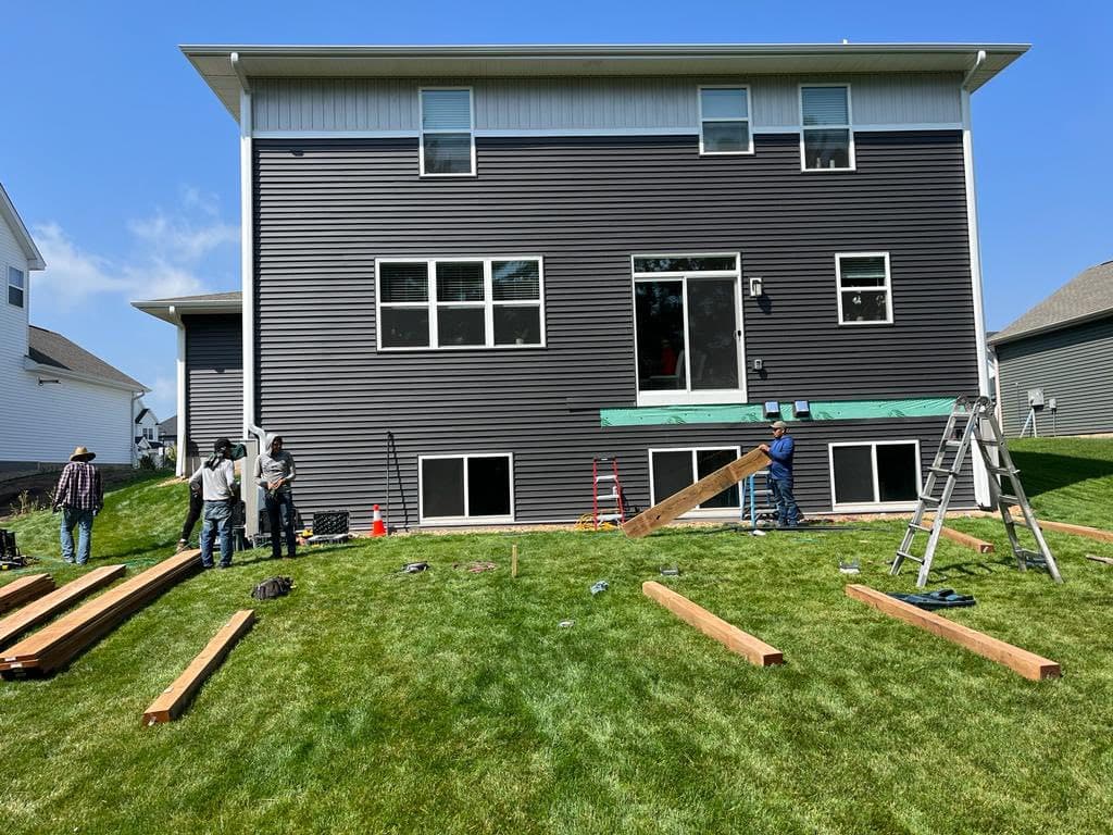 JVM Construction crew working on a deck build in the Twin Cities